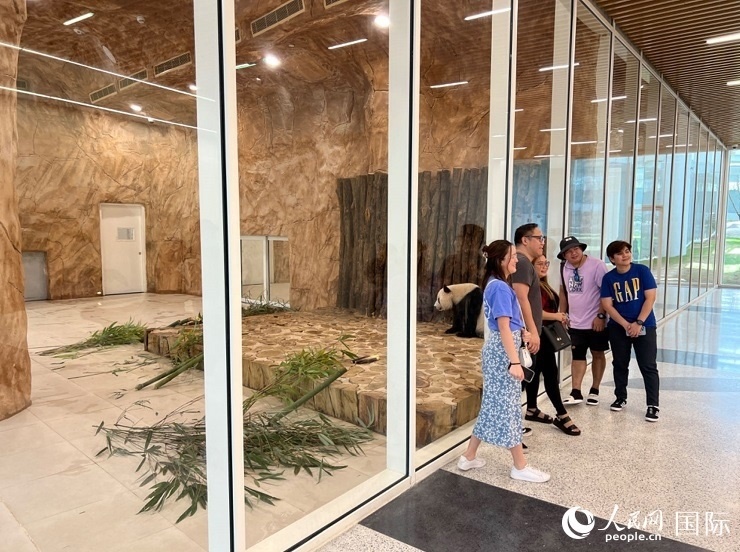 當(dāng)?shù)赜慰团c“四?！焙嫌?。人民網(wǎng)記者 張志文攝