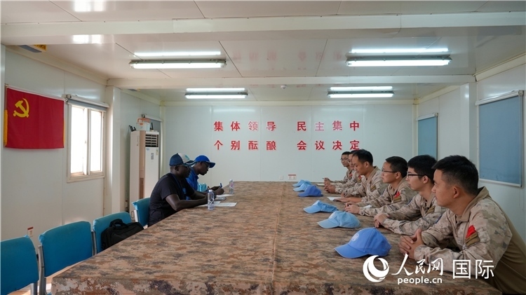 圖1 檢查組聽取工作匯報(bào)。王軍杰攝