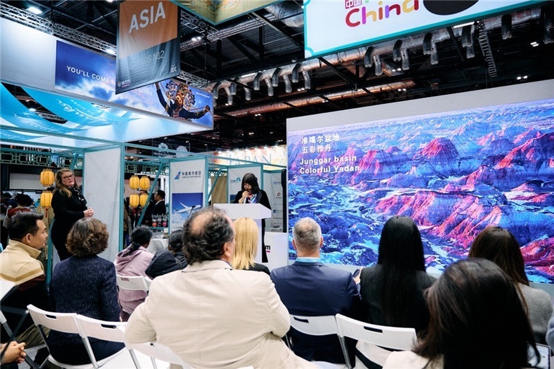  “中國館”新疆旅游推介會現(xiàn)場介紹。楊浩鵬攝